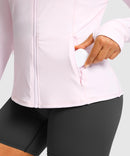 women's zip-up slim fit hip length jacket in light pink - zipper pocket detail view