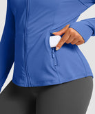 women's zip-up slim fit hip length jacket in navy blue - zipper pocket detail view
