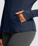 women's zip-up slim fit hip length jacket in navy - zipper pocket detail view