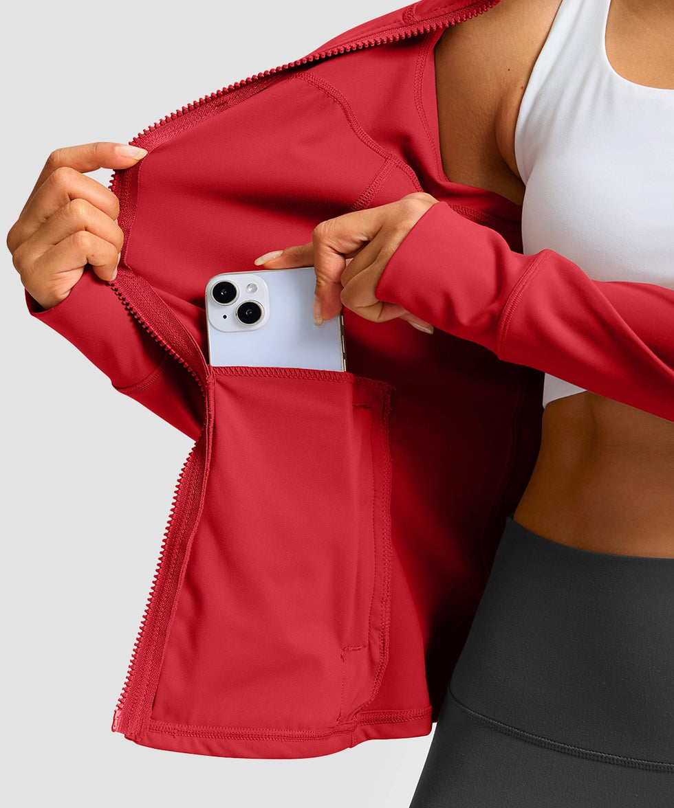 women's zip-up slim fit hip length jacket in savannah red - zipper pocket detail view
