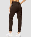 zipper pocket tapered joggers in brown - back view