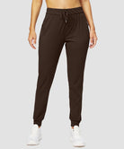 zipper pocket tapered joggers in brown - front view