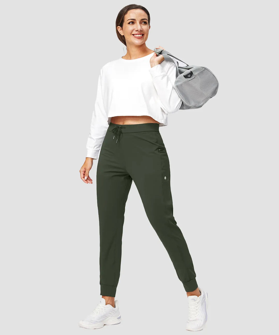 zipper pocket tapered joggers in olive green on model